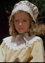 A picture of Nellie Oleson as she judges Mary and Laura Ingalls in the Country Girls episode of Little House on the Prairie.